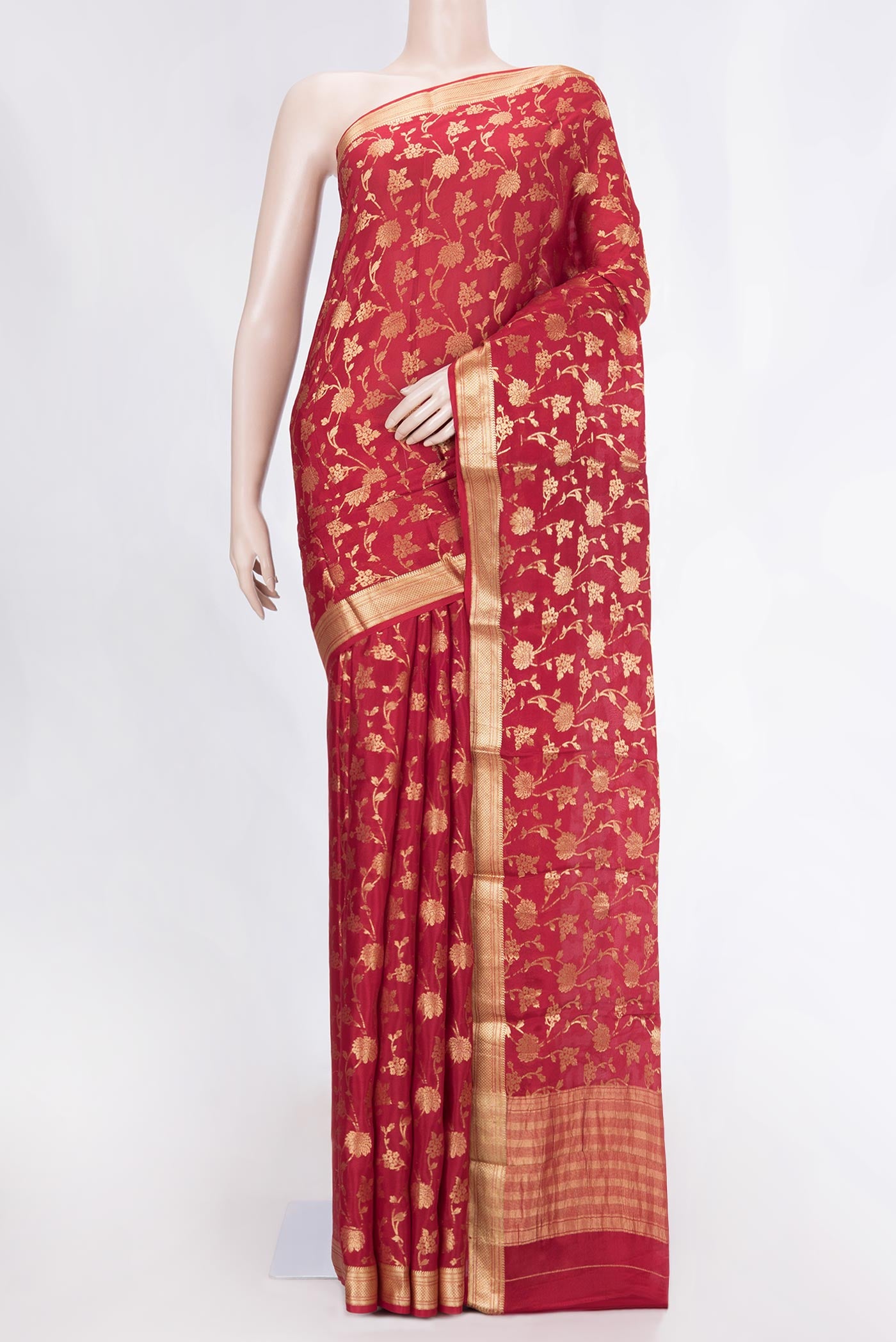 Red Mysore Crepe Saree with Zari Brocade on the body and Zari Border displayed on a mannequin