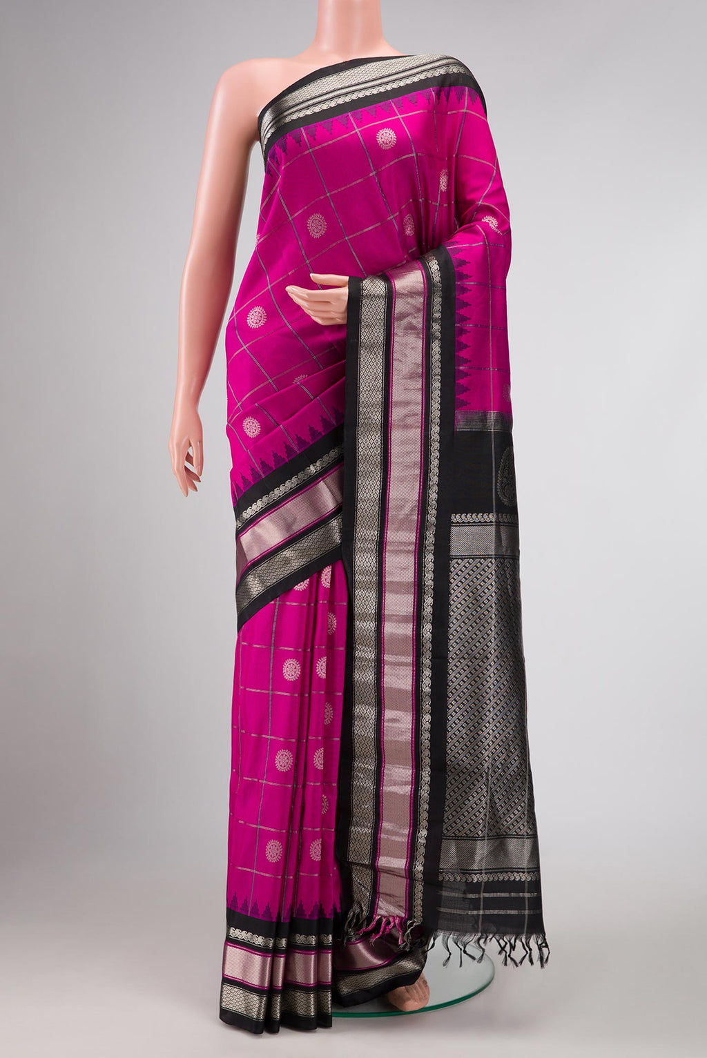 Pink Dual Tone Gadwal Silk Saree with Checked design on the body and Zari Border displayed on a mannequin