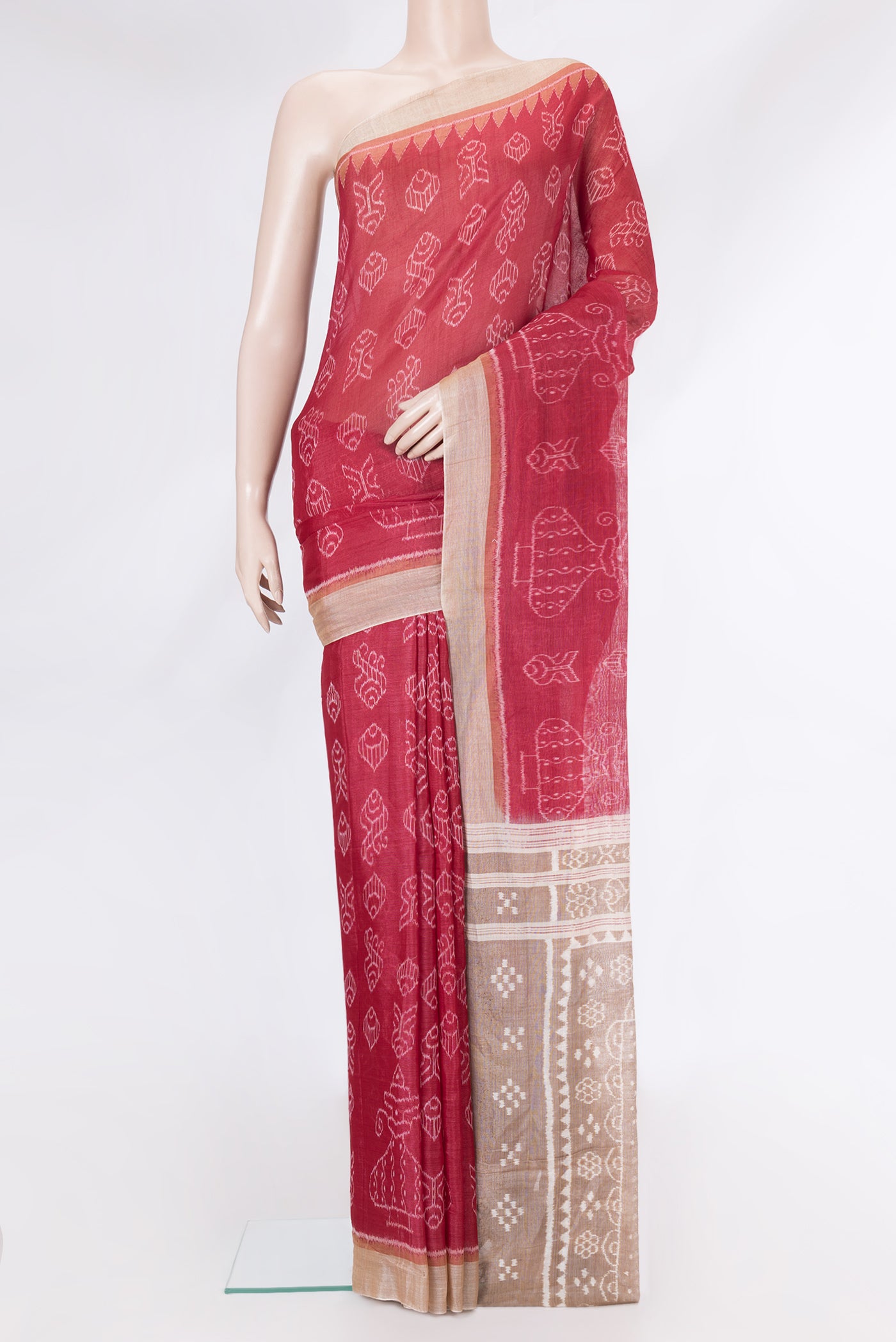 Deep Red Dual Tone Tussar Silk Saree with Printed design on the body and Ikat Border.  displayed on a mannequin