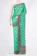 Sea Green Dual Tone Kanjivaram Silk Saree with Printed design on the body and Printed Border.  displayed on a mannequin