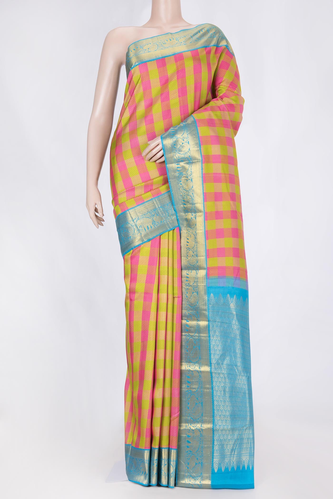 Parrot Green and Pink Color Kanchipuram Saree with Jacquard design on the body and Zari Border displayed on a mannequin