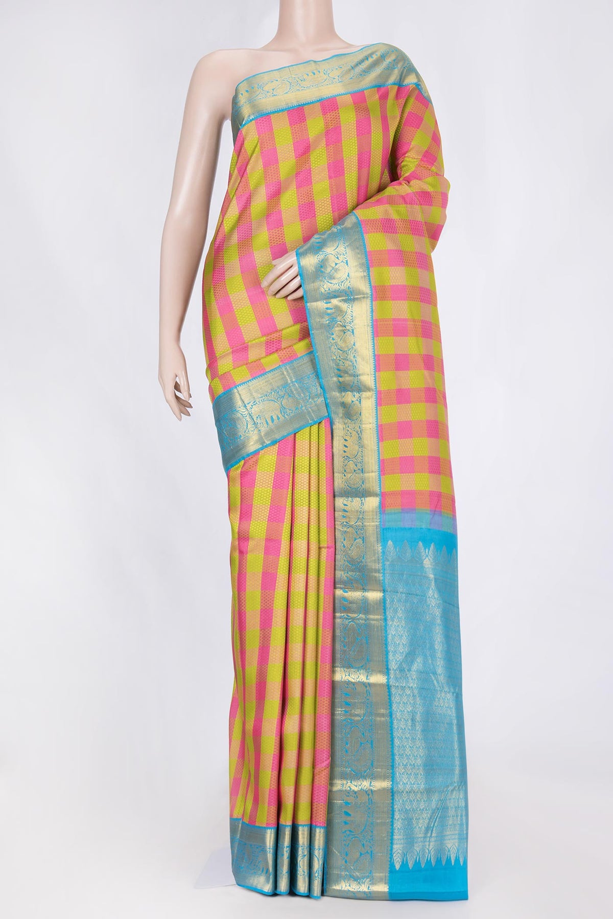 Parrot Green and Pink Color Kanchipuram Saree with Jacquard design on the body and Zari Border displayed on a mannequin
