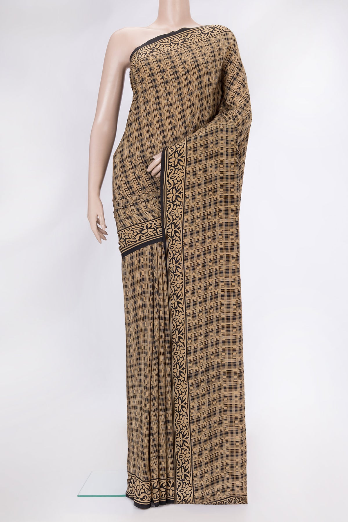 Black Dual Tone Mysore Crepe Saree with Printed design on the body and Printed Border.  displayed on a mannequin
