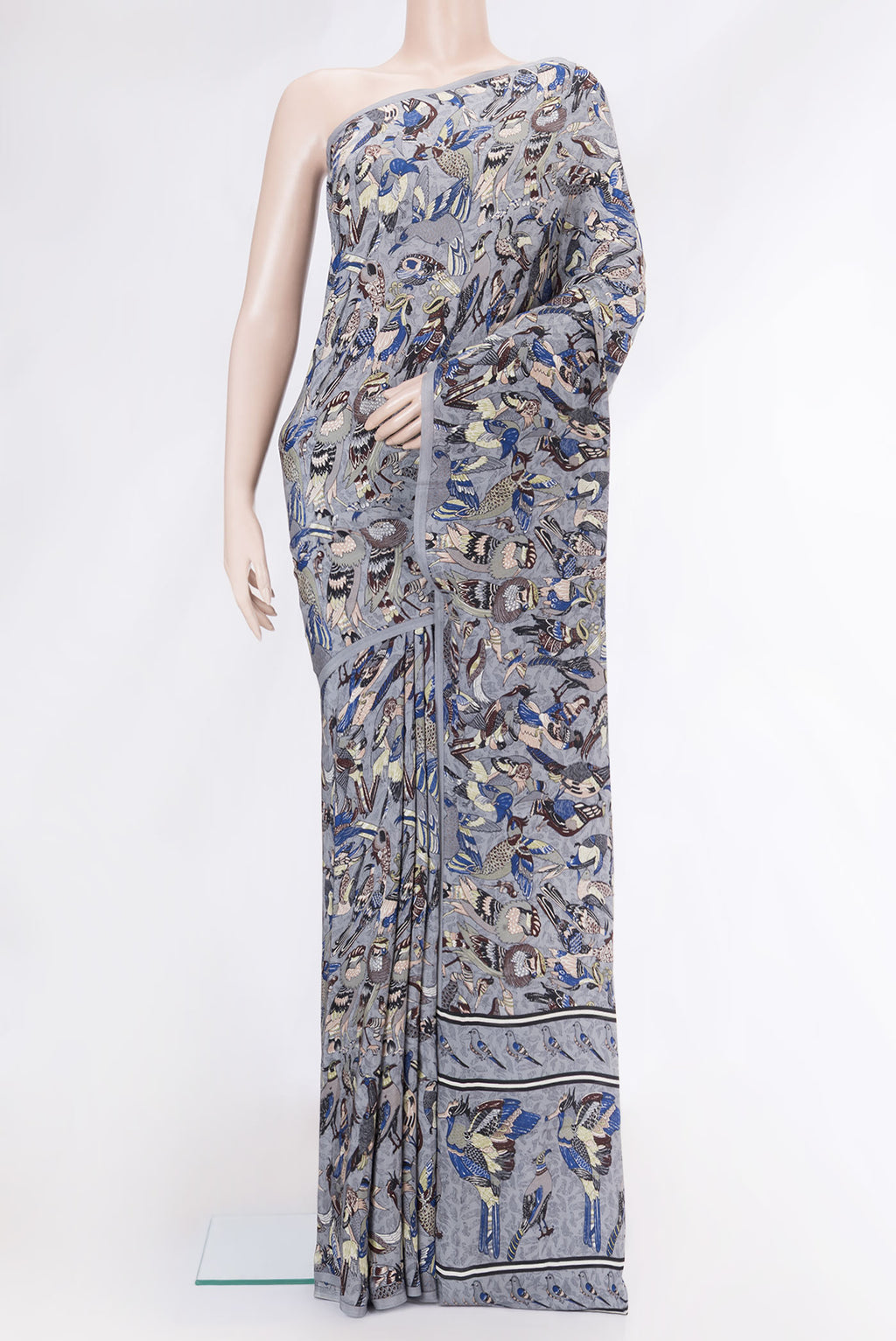 Grey Dual Tone Mysore Crepe Saree with Printed design on the body and Without Border.  displayed on a mannequin