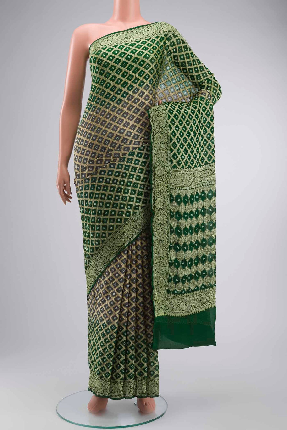 Green Banarasi Georgette Saree with Zari Butta on the body and Zari Border displayed on a mannequin