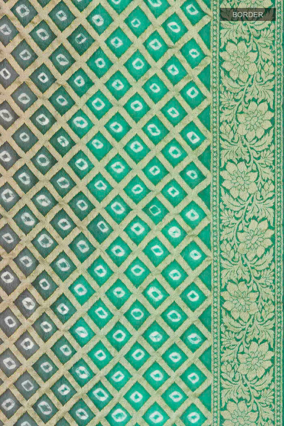 Border image of Grey Banarasi Georgette Saree with Bandhani Print on the body and Zari Border