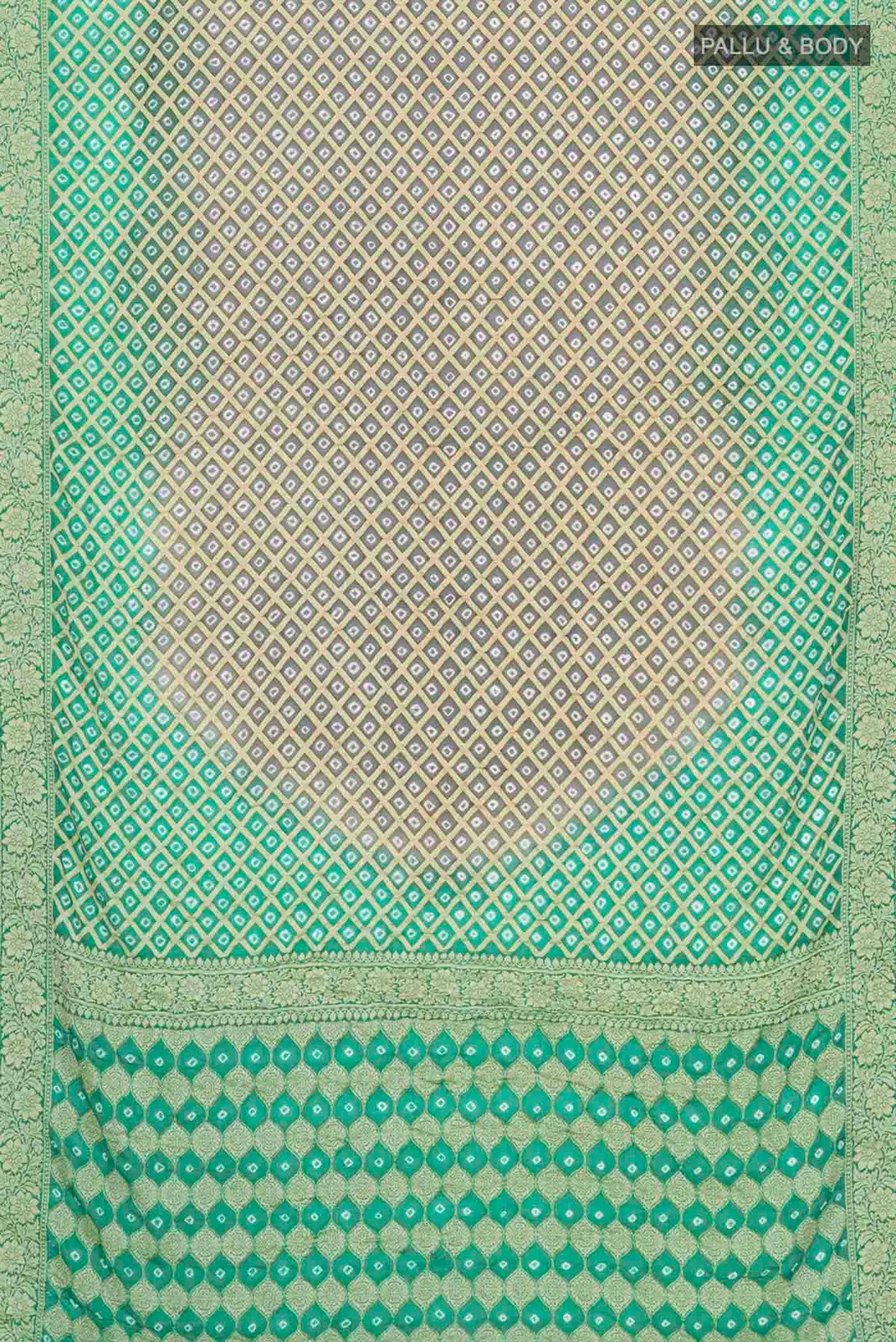 Flat view of Grey Banarasi Georgette Saree with Bandhani Print on the body and Zari Border