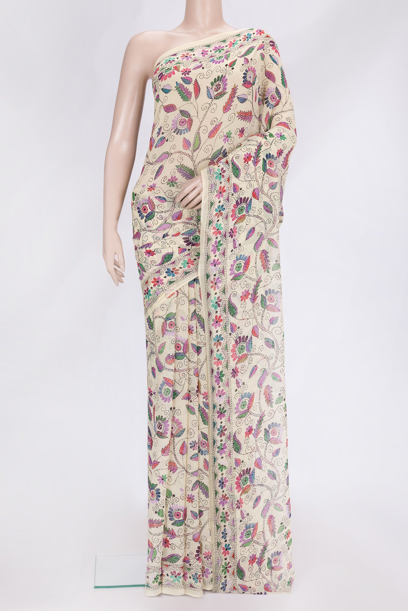 Beige Dual Tone Mysore Georgette Saree with Printed design on the body and Printed Border.  displayed on a mannequin