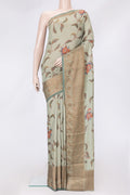 Pista Green Dual Tone Tussar Silk Saree with Printed design on the body and Thread Border.  displayed on a mannequin