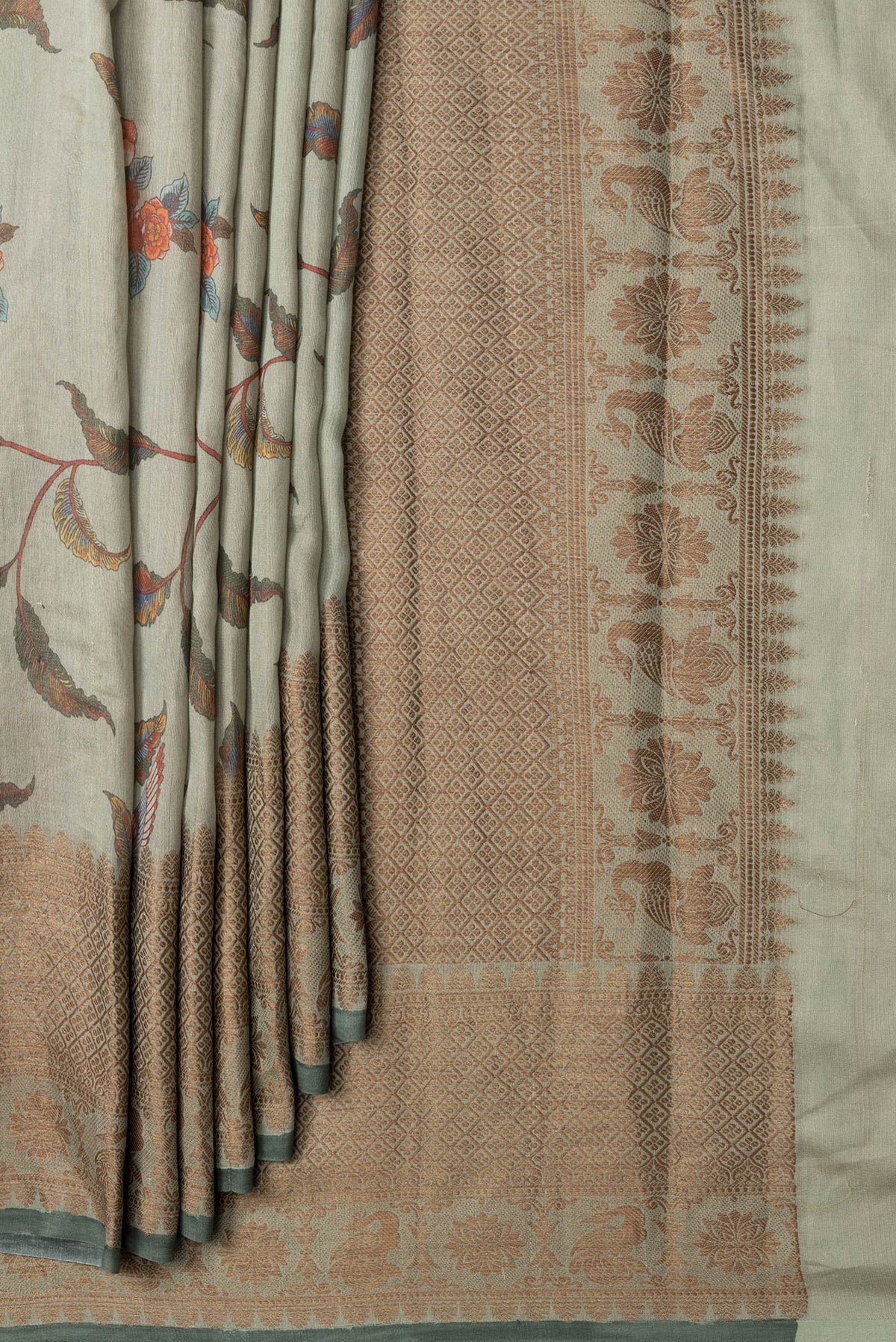 Pleats and pallu of Pista Green Dual Tone Tussar Silk Saree with Printed design on the body and Thread Border. 