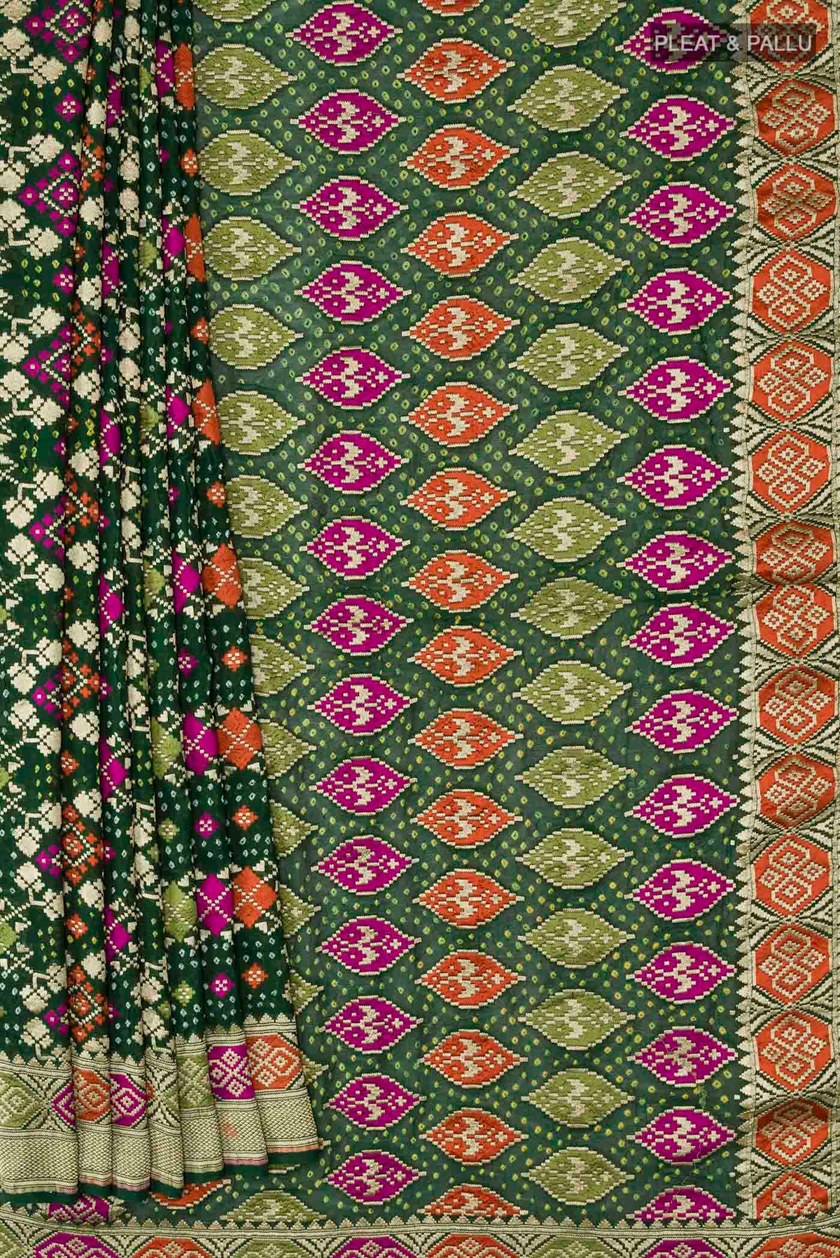 Pleats and pallu of Green Banarasi Georgette Saree with Bandhani Print on the body and Zari Border
