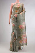 Light Green Dual Tone Organza Silk Saree with Stripes on the body and Without Border.  displayed on a mannequin