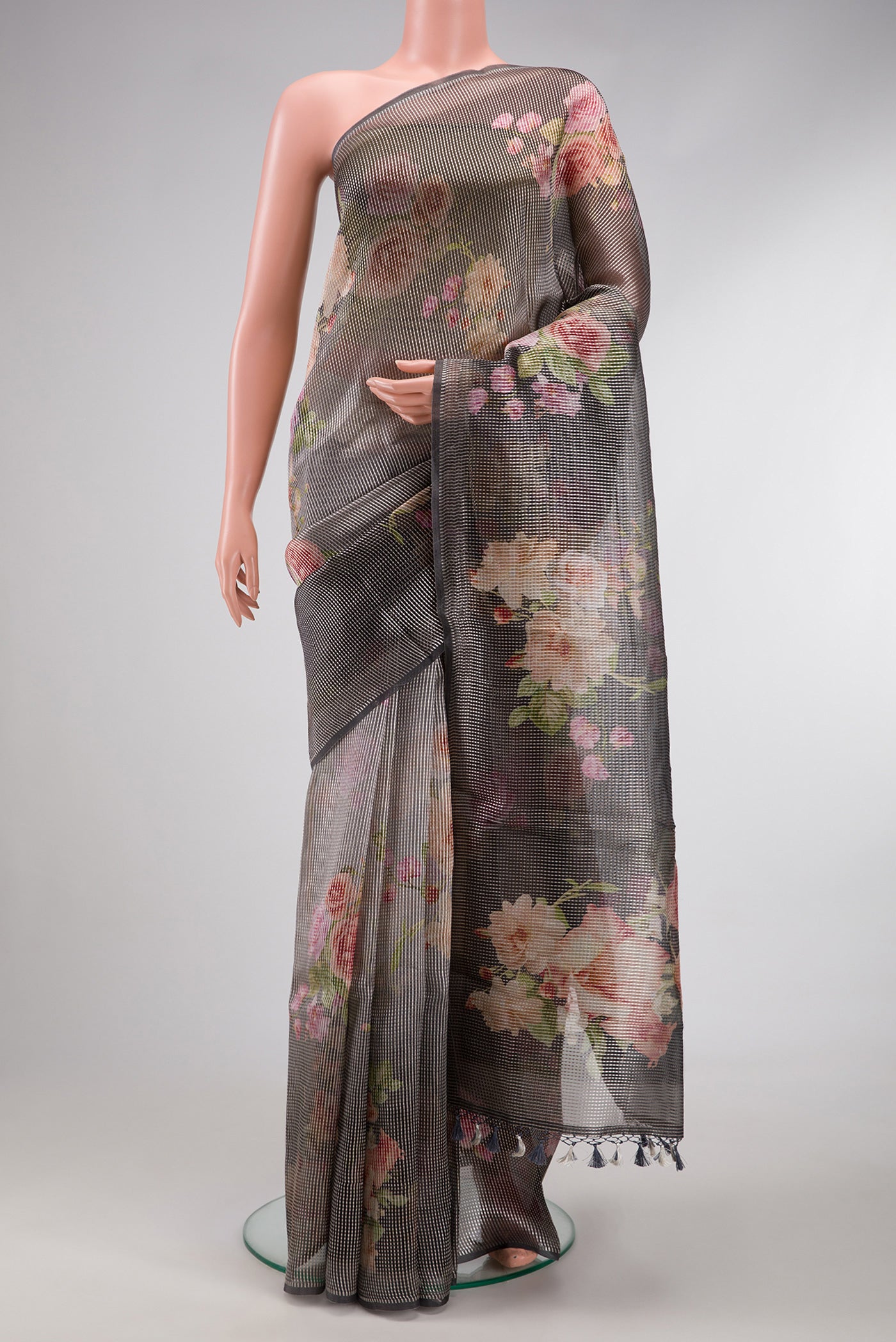 Grey Dual Tone Organza Silk Saree with Printed design on the body and Without Border.  displayed on a mannequin