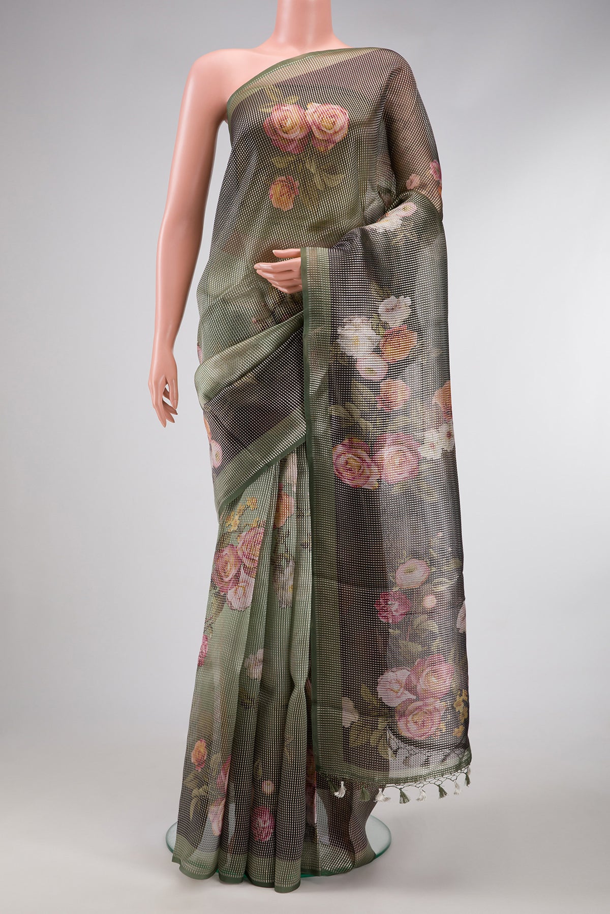 Green Dual Tone Organza Silk Saree with Printed design on the body and Without Border.  displayed on a mannequin