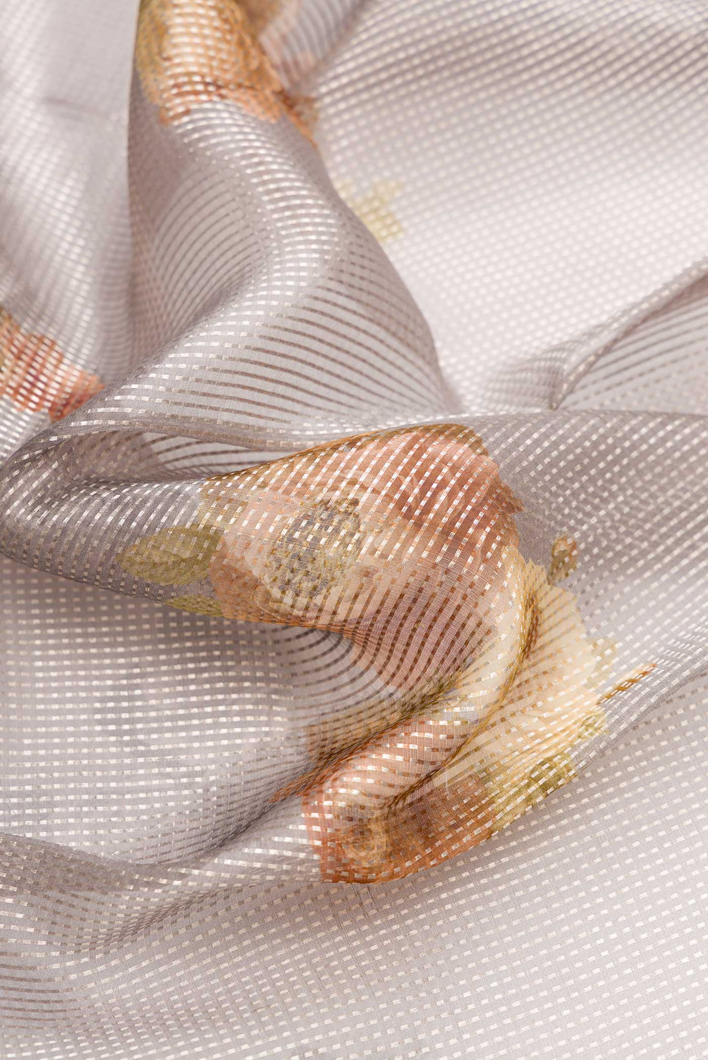 Close up of Grey Dual Tone Organza Silk Saree with Stripes on the body and Without Border.  displaying folds