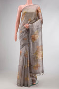 Grey Dual Tone Organza Silk Saree with Stripes on the body and Without Border.  displayed on a mannequin