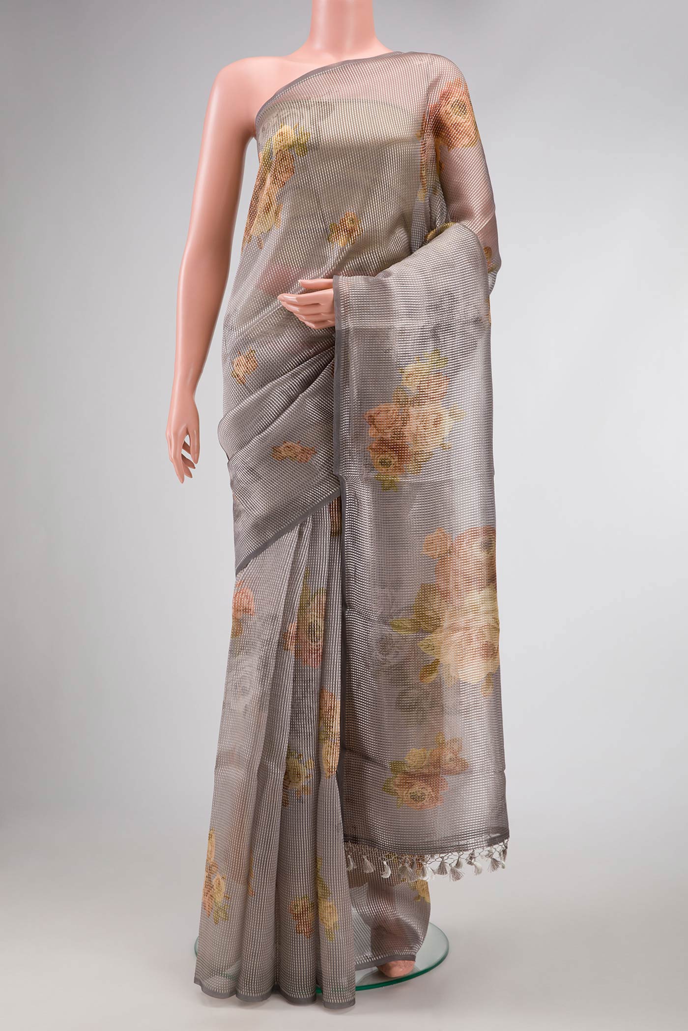 Grey Dual Tone Organza Silk Saree with Stripes on the body and Without Border.  displayed on a mannequin