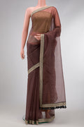 Brown Dual Tone Organza Silk Saree with Printed design on the body and Embroidery Border.  displayed on a mannequin