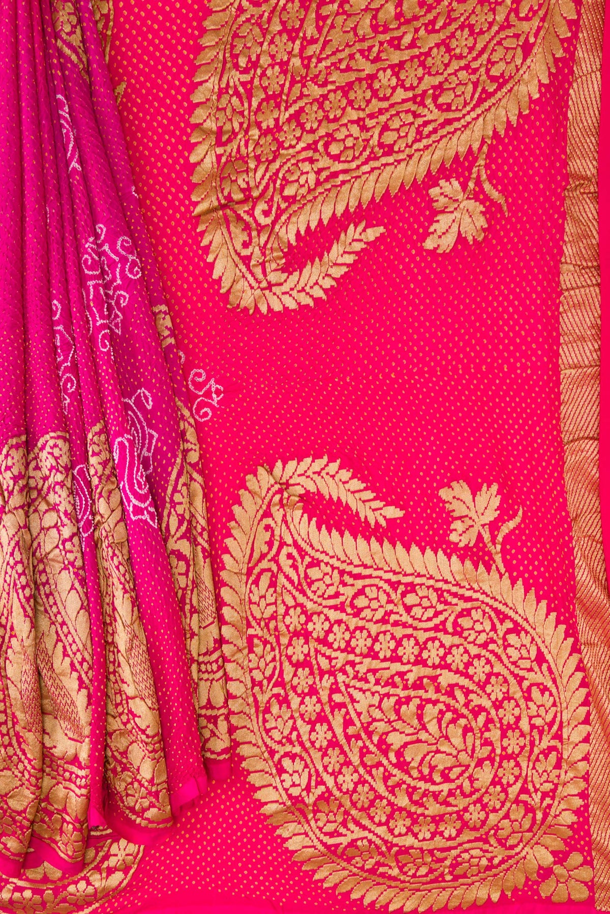 Pleats and pallu of Pink Dual Tone Bandhani Silk Saree with Bandhani Print on the body and Fancy Border. 