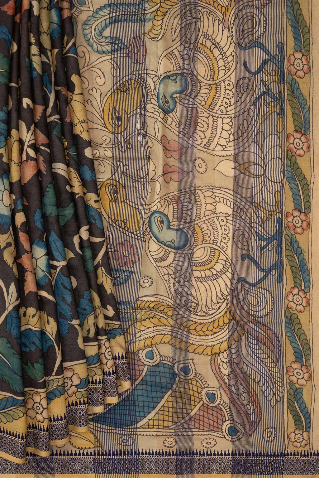 Pleats and pallu of Brown Dual Tone Tussar Silk Saree with Printed design on the body and Printed Border. 