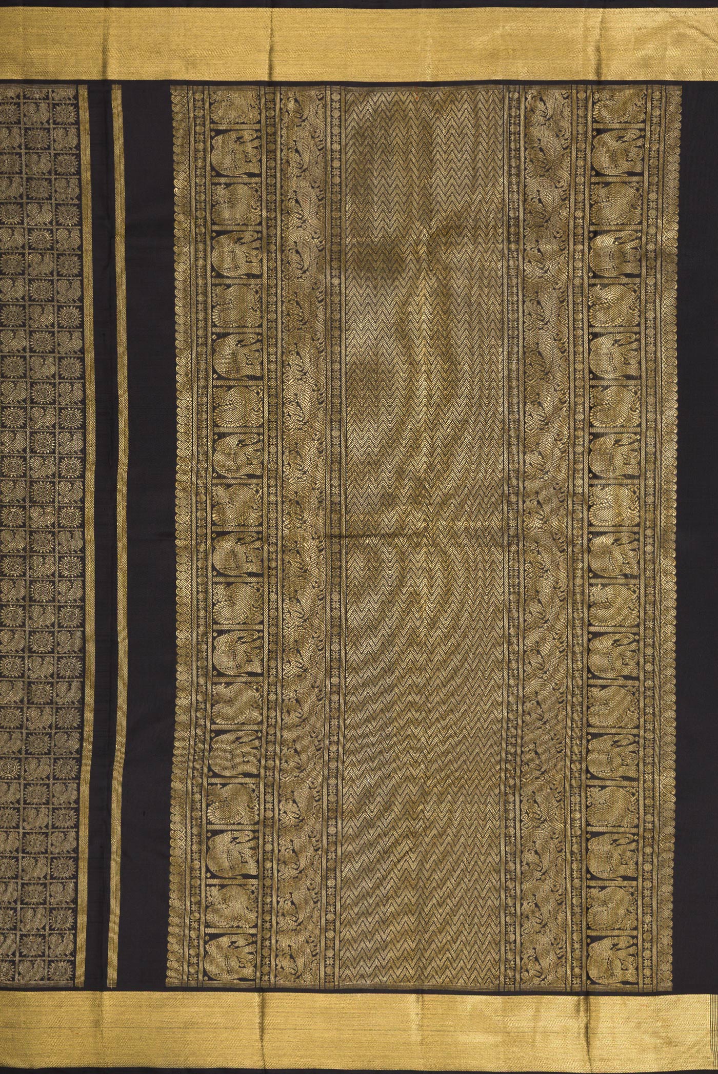 Close up image of the pallu of Pure Silk Pure Zari Black Dual Tone Kanjivaram Saree with Zari Brocade on the body and Zari Border. 