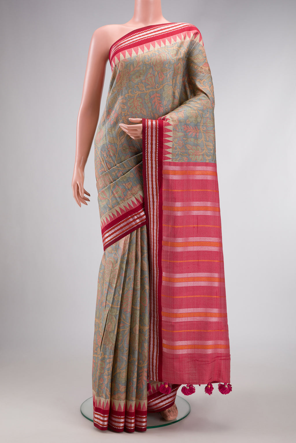 Beige Dual Tone Tussar Silk Saree with Printed design on the body and Thread Border.  displayed on a mannequin