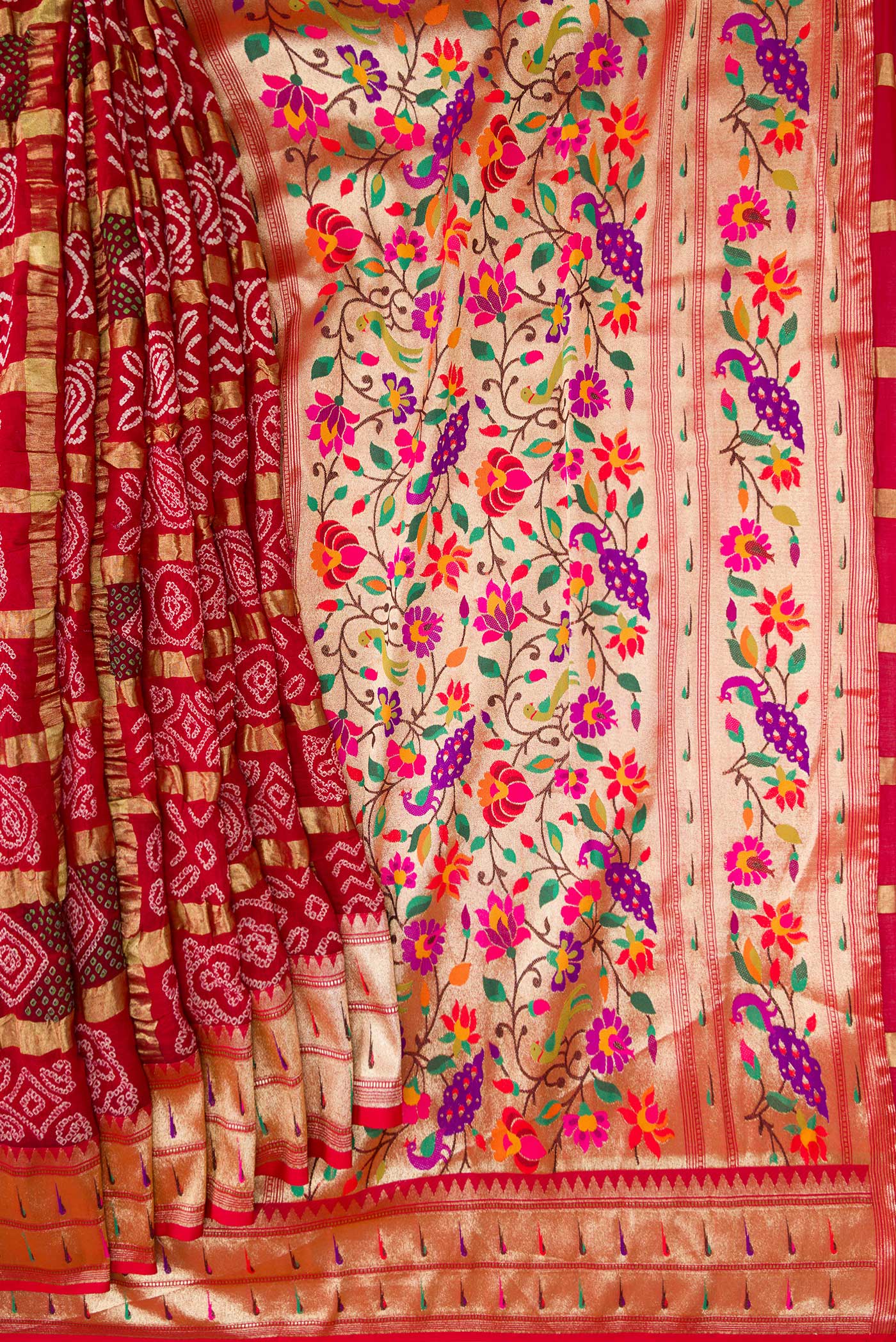 Pleats and pallu of Red Dual Tone Bandhani Silk Saree with Bandhani Print on the body and Paithani Border. 