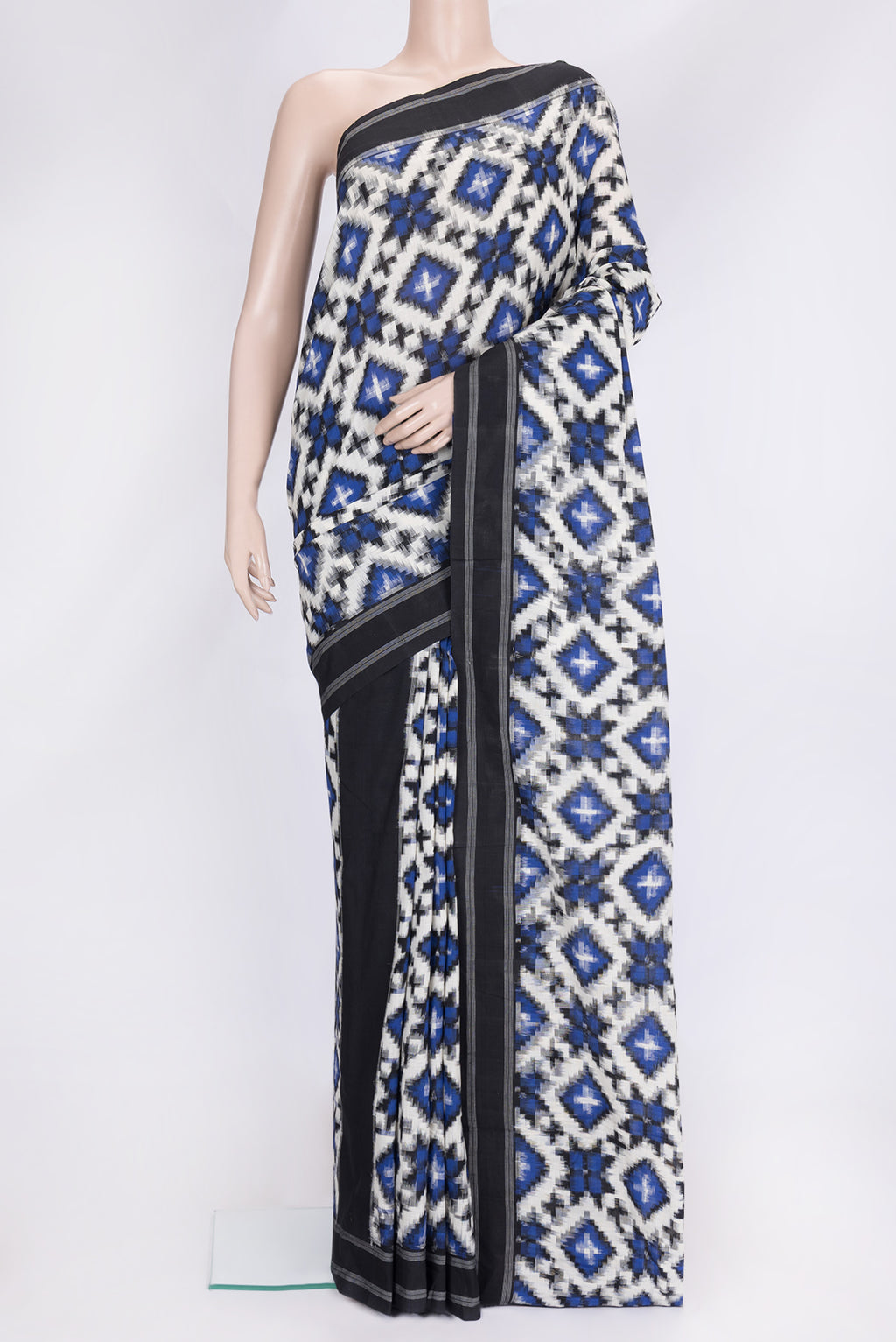 Off White Dual Tone Double Ikat Saree with Ikat Print on the body and Thread Border.  displayed on a mannequin