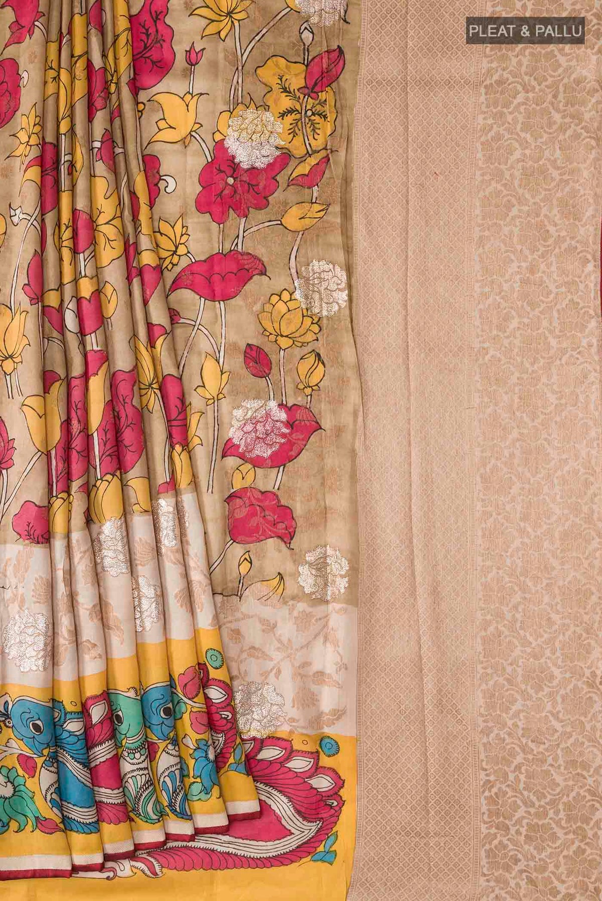 Pleats and pallu of Beige Kalamkari Cotton Saree with kalamkari Print on the body and Zari Border