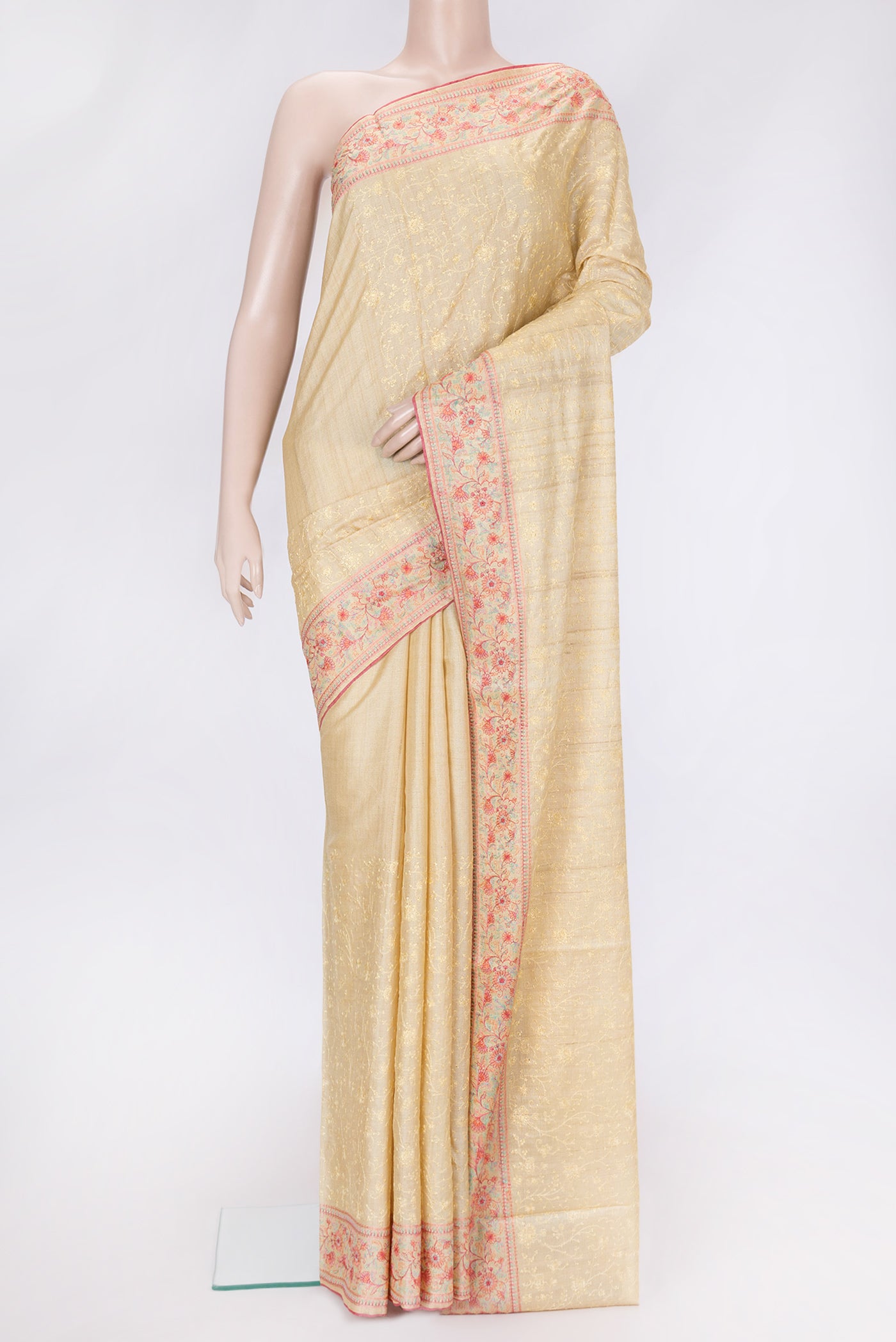 Sandal Dual Tone Tussar Silk Saree with Embroidery on the body and Embroidery Border.  displayed on a mannequin