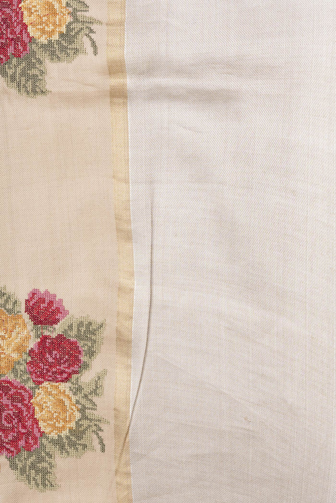 Border image of Beige Dual Tone Tussar Silk Saree with Embroidery on the body and Zari Border. 