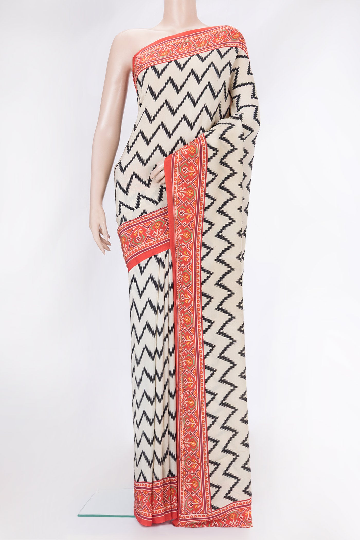 Beige Dual Tone Mysore Crepe Saree with Printed design on the body and Printed Border.  displayed on a mannequin