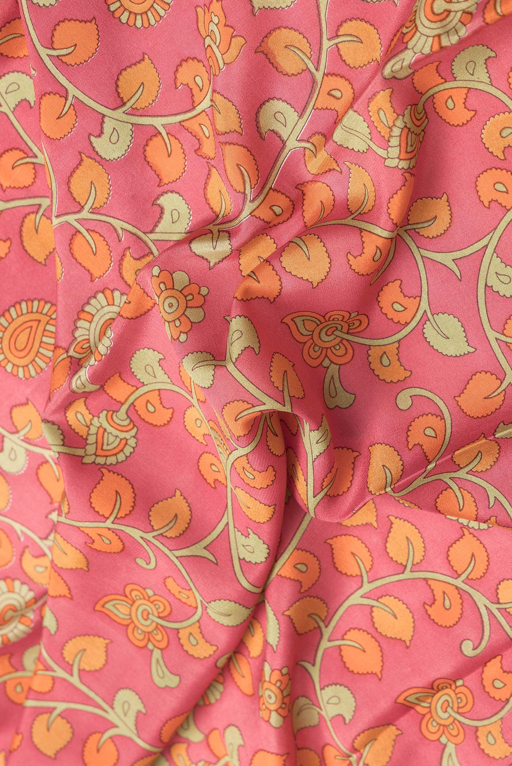 Close up of Pink Dual Tone Mysore Crepe Saree with kalamkari Print on the body and Zari Border.  displaying folds