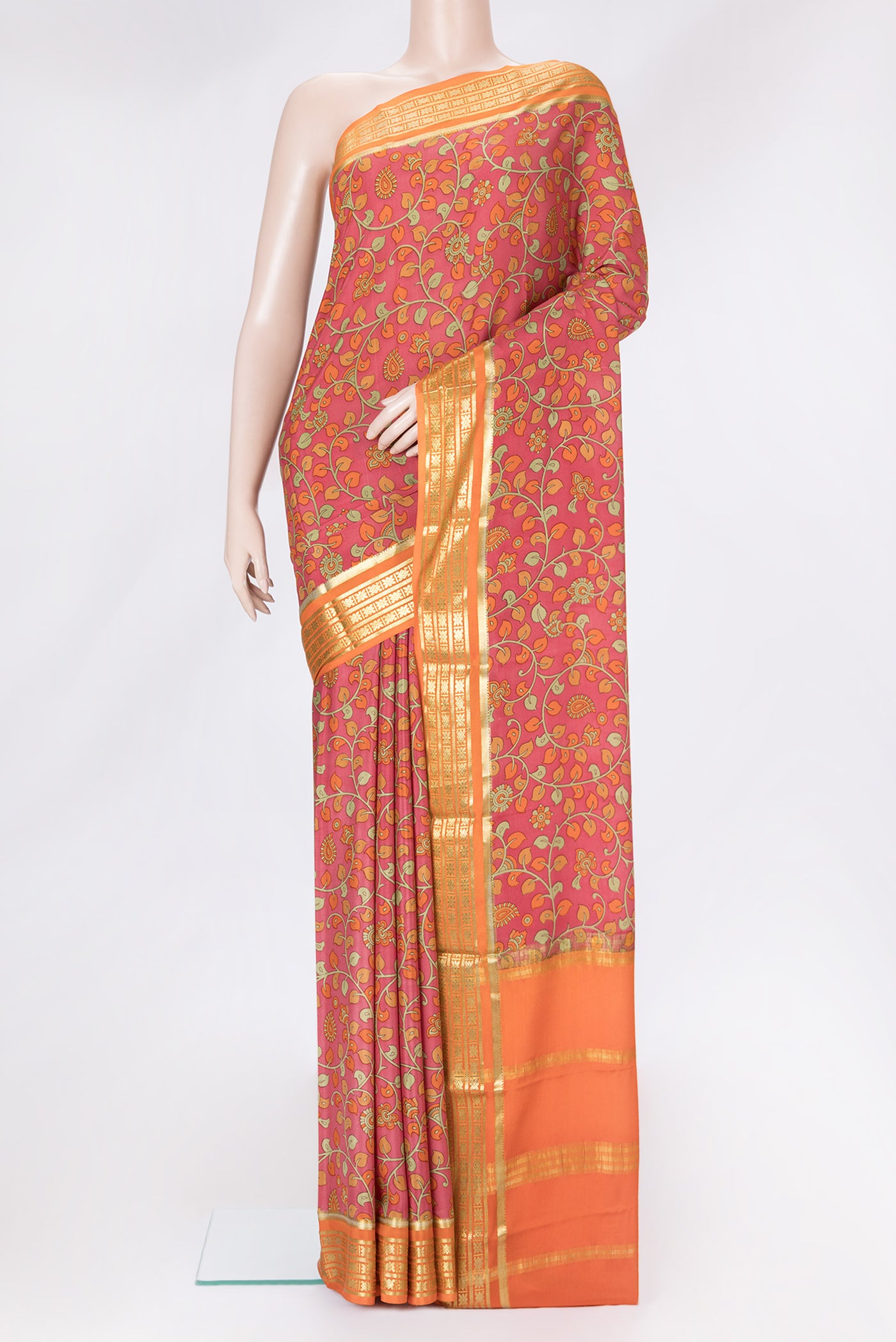 Pink Dual Tone Mysore Crepe Saree with kalamkari Print on the body and Zari Border.  displayed on a mannequin