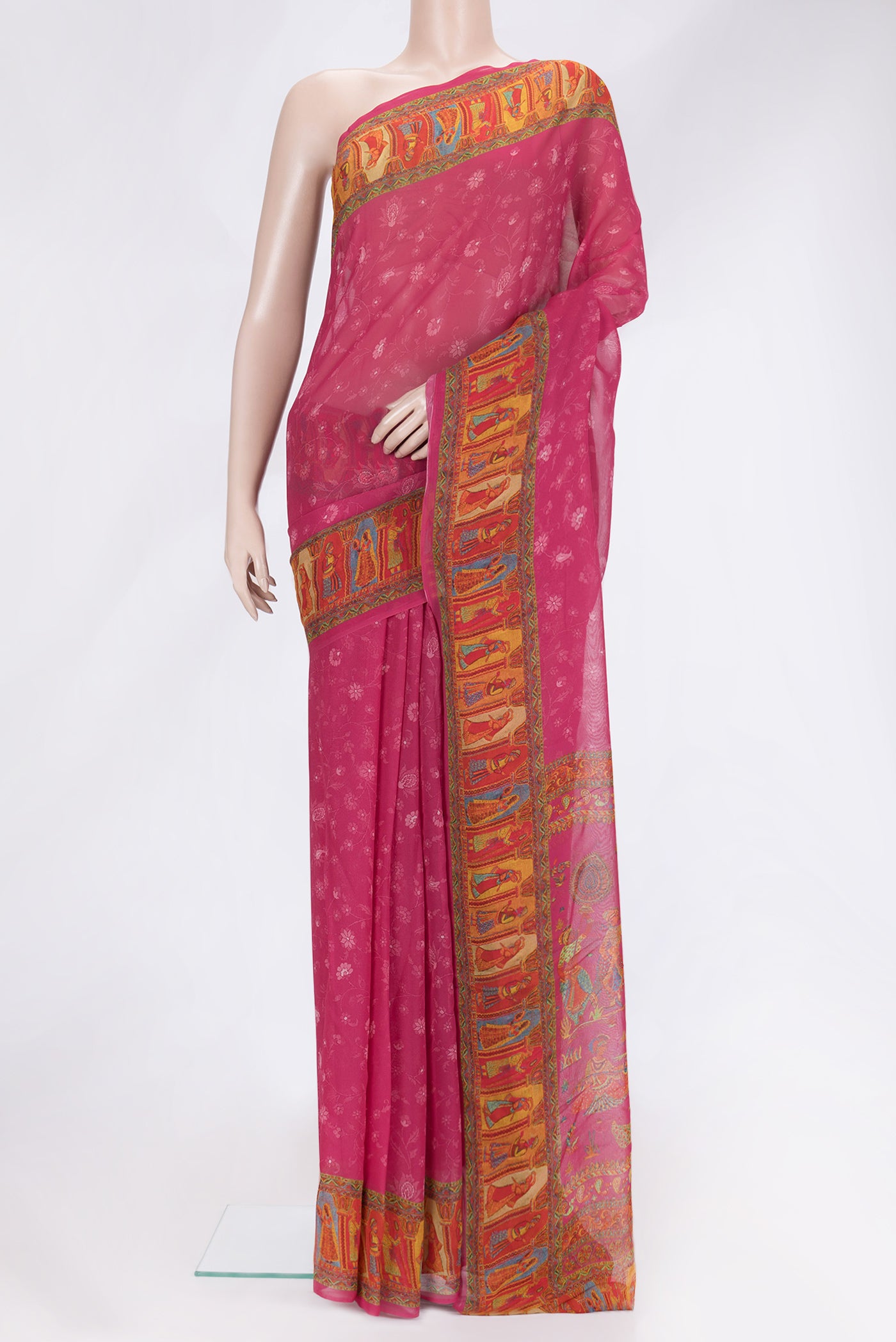 Pink Dual Tone Mysore Georgette Saree with Printed design on the body and Printed Border.  displayed on a mannequin