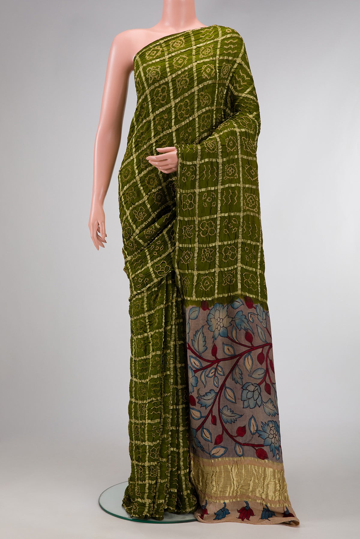 Mehandi Green Dual Tone Bandhani Silk Saree with Bandhani Print on the body and Without Border.  displayed on a mannequin