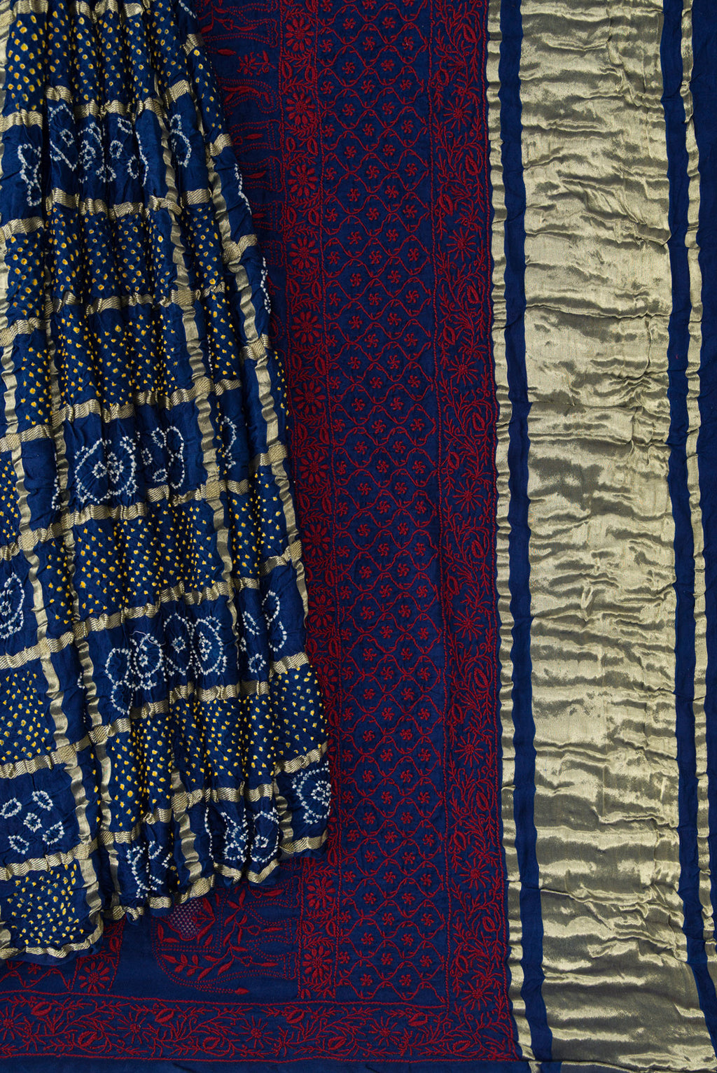 Pleats and pallu of Navy Blue Dual Tone Bandhani Silk Saree with Bandhani Print on the body and Without Border. 