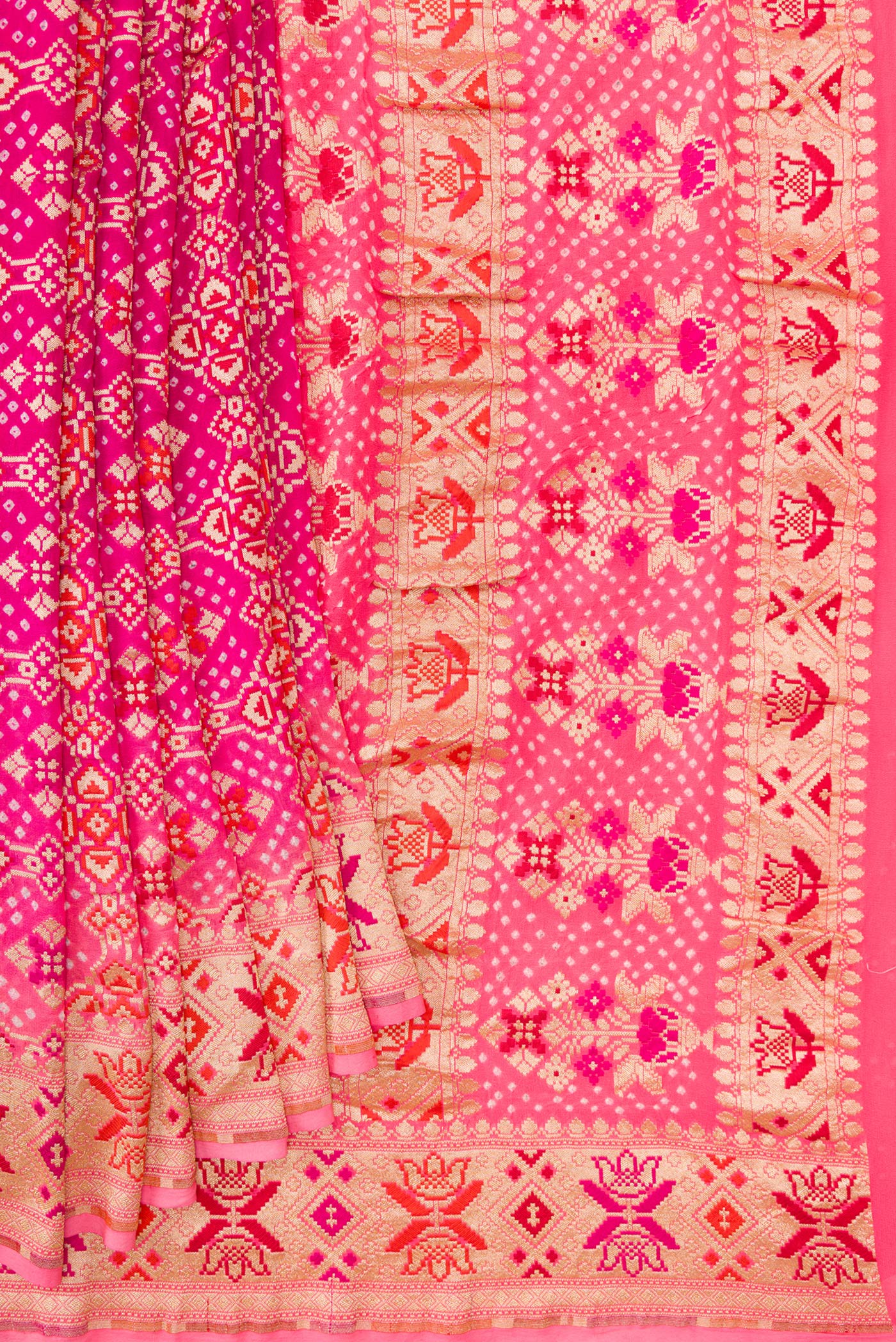 Pleats and pallu of Dark Pink Dual Tone Banarasi Georgette Saree with Zari Brocade on the body and Zari Border. 