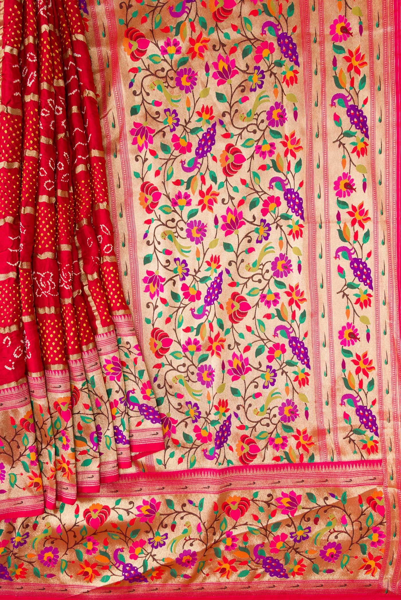 Pleats and pallu of Red Dual Tone Bandhani Silk Saree with Bandhani Print on the body and Fancy Border. 