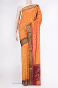 Mustard Dual Tone Rajkot Patola Silk Saree with Ikat Print on the body and Zari Border.  displayed on a mannequin