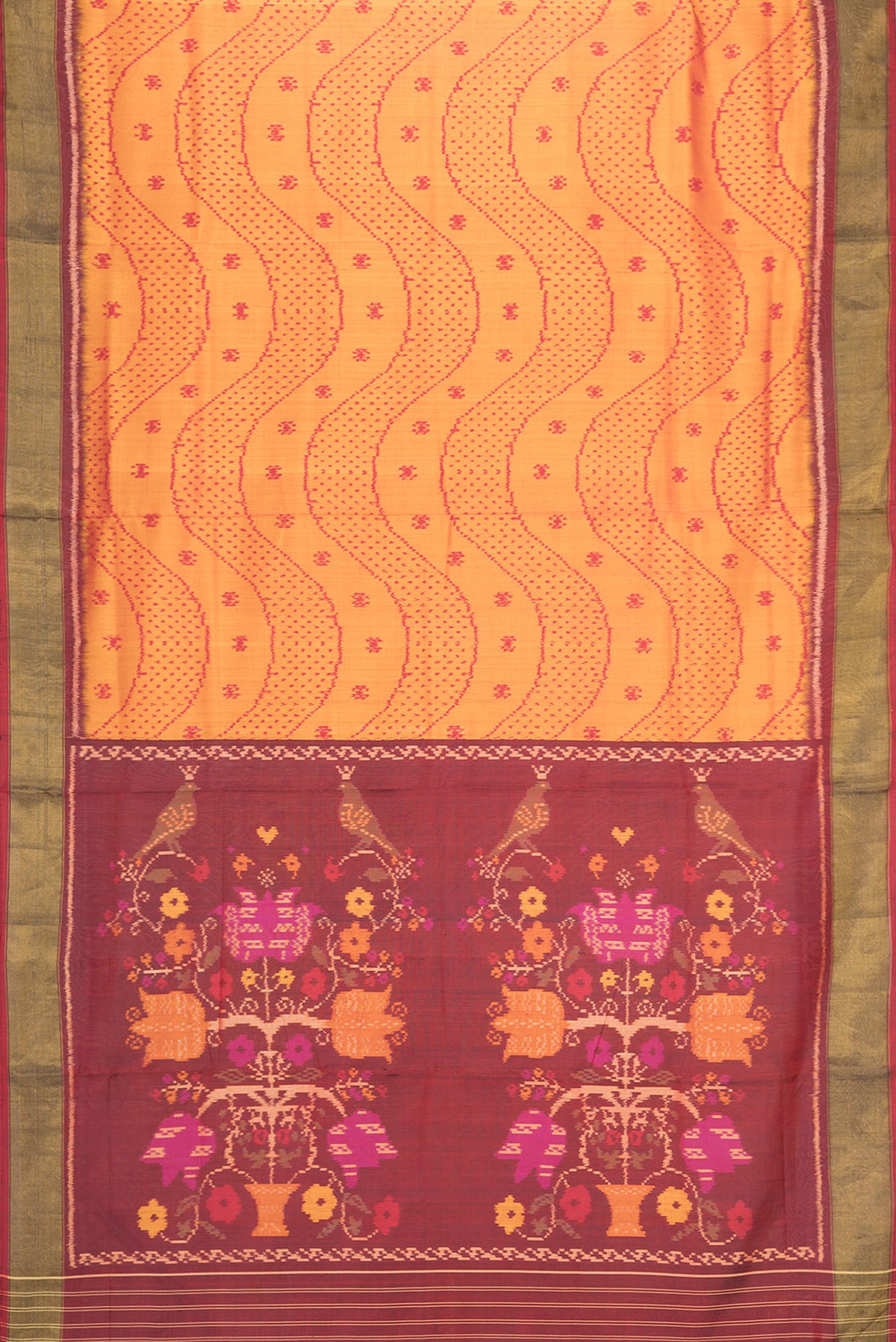 Flat view of Mustard Dual Tone Rajkot Patola Silk Saree with Ikat Print on the body and Zari Border. 