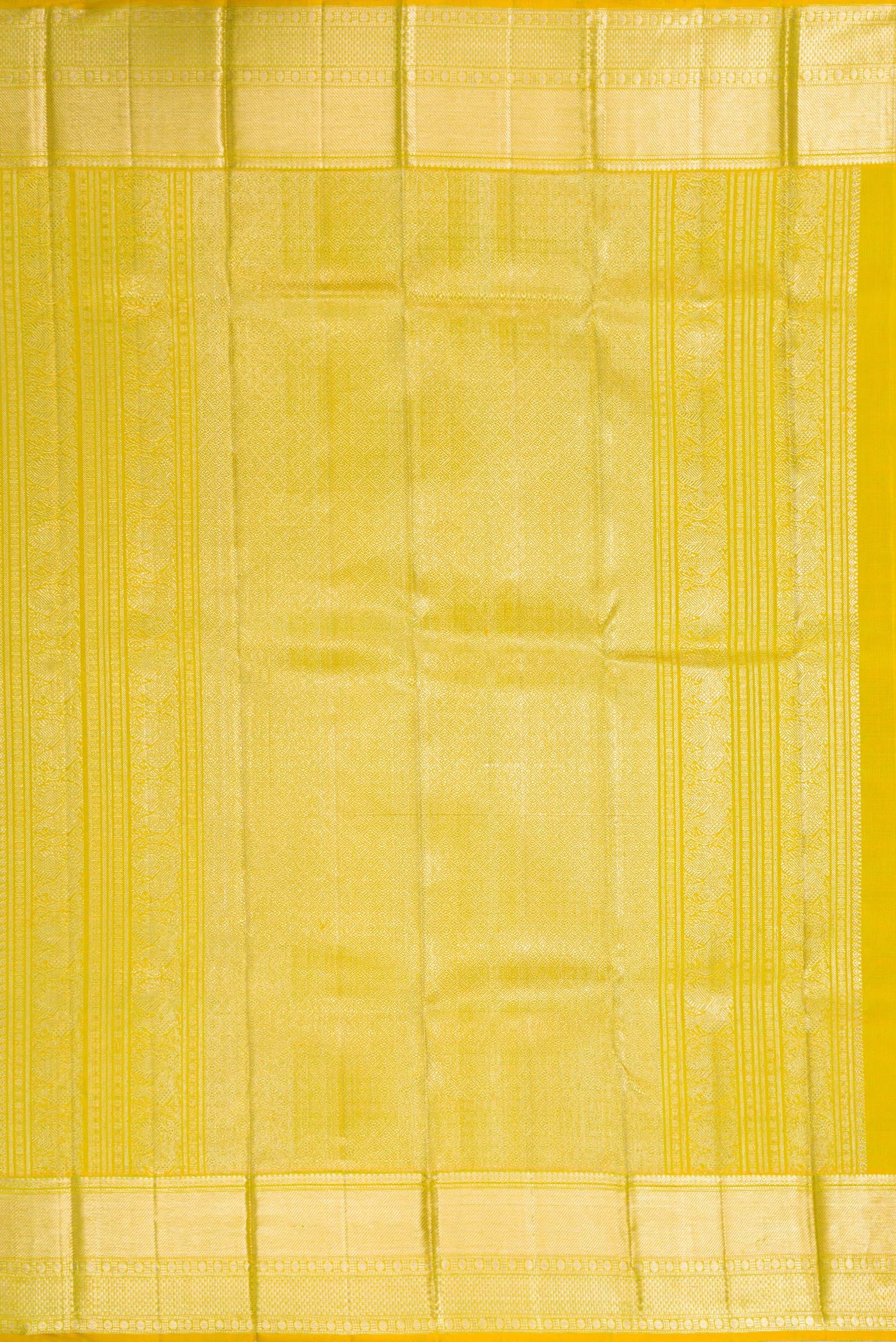 Close up image of the pallu of Parrot Green Dual Tone Kanjivaram Silk Saree with Zari Brocade on the body and Zari Border. 