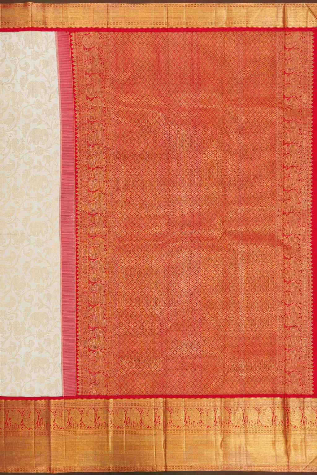 Close up image of the pallu of Off White Dual Tone Kanchipuram Silk Saree with Zari Brocade on the body and Zari Border. 