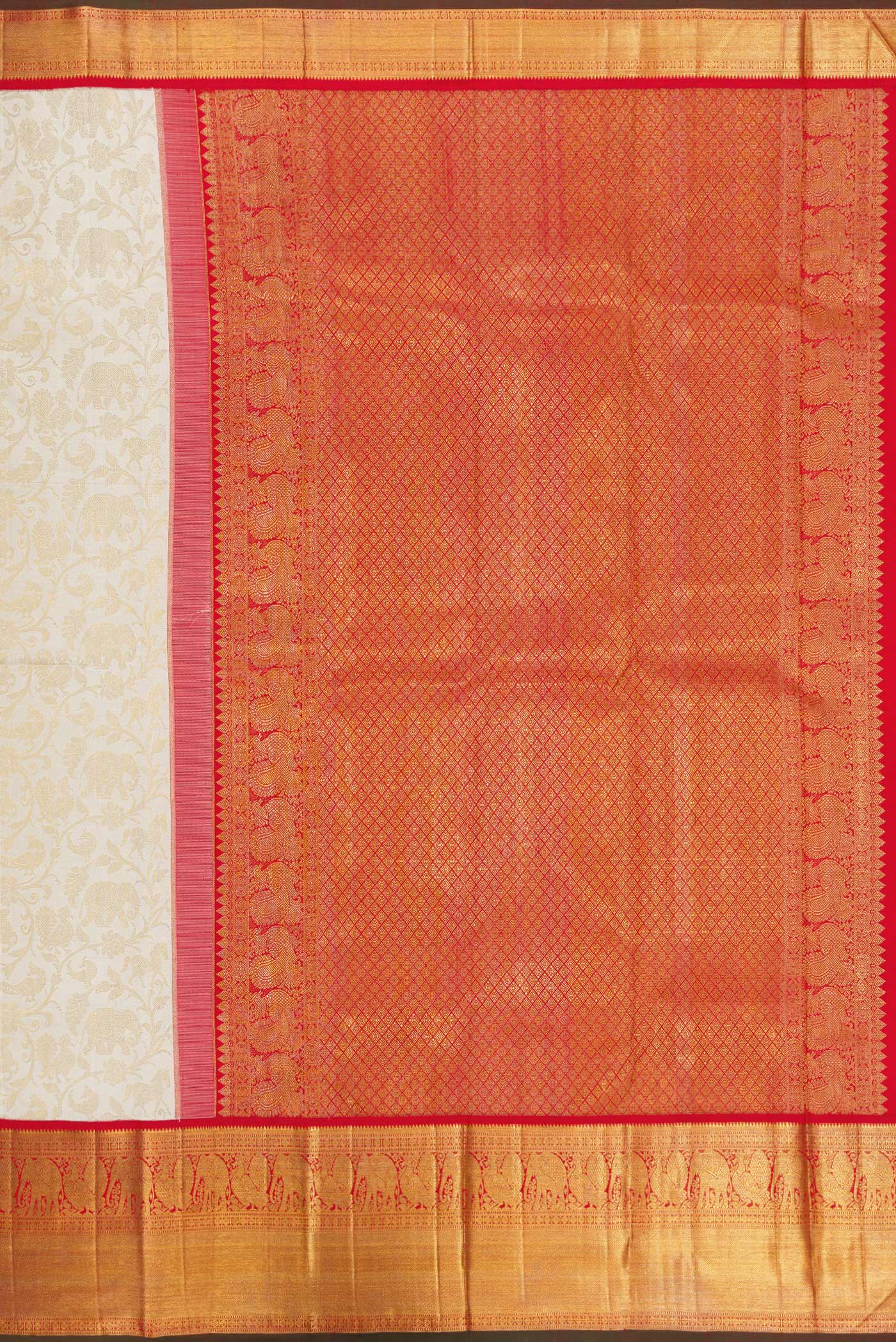 Close up image of the pallu of Off White Dual Tone Kanchipuram Silk Saree with Zari Brocade on the body and Zari Border. 