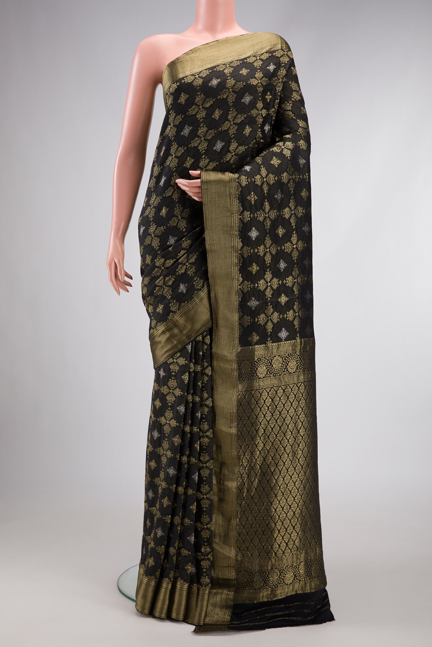 Black Dual Tone Mysore Georgette Saree with Zari Brocade on the body and Zari Border.  displayed on a mannequin