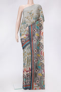 Grey Dual Tone Tussar Silk Saree with Printed design on the body and Embroidery Border.  displayed on a mannequin