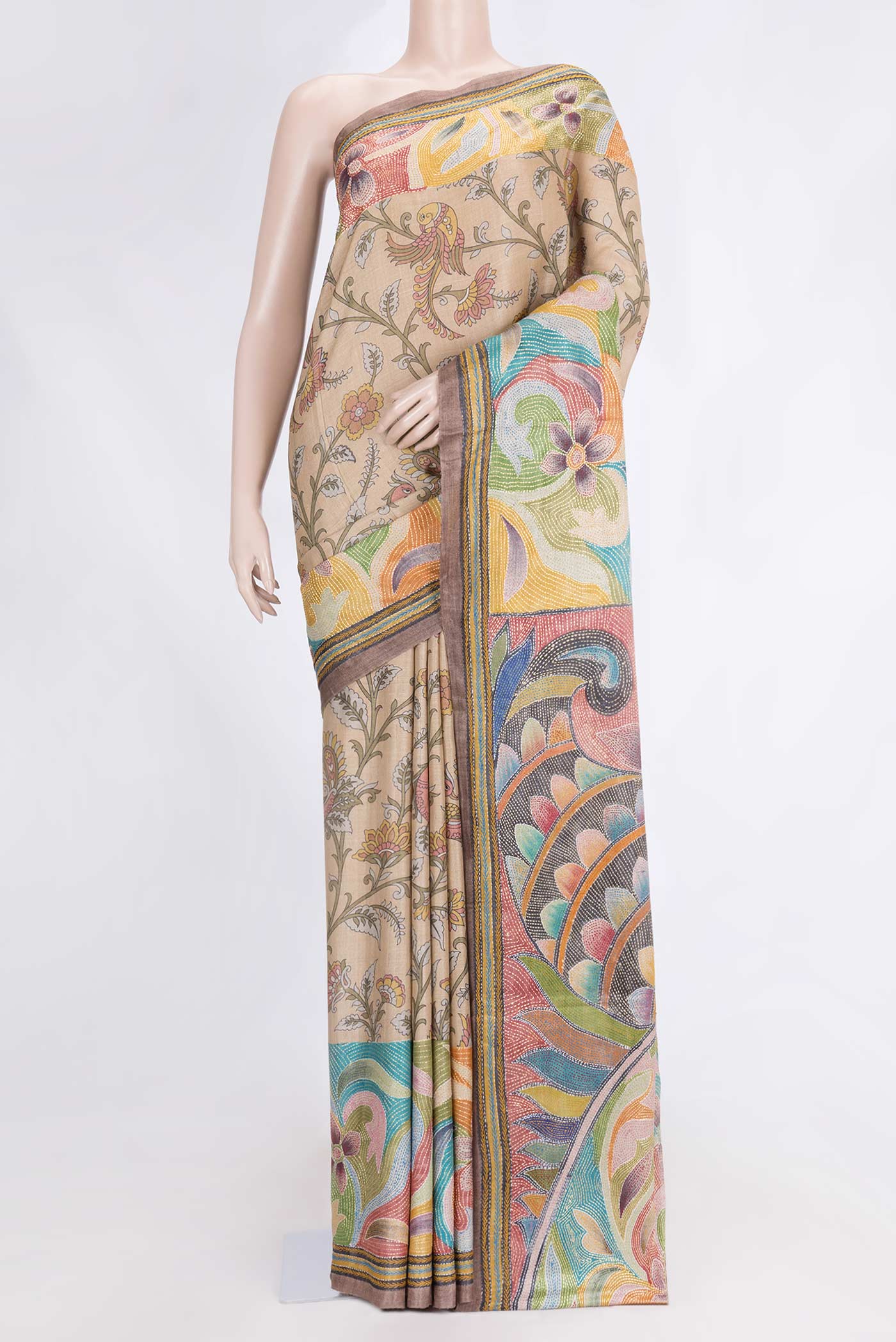 Beige Dual Tone Tussar Saree with Printed design on the body and Embroidery Border.  displayed on a mannequin