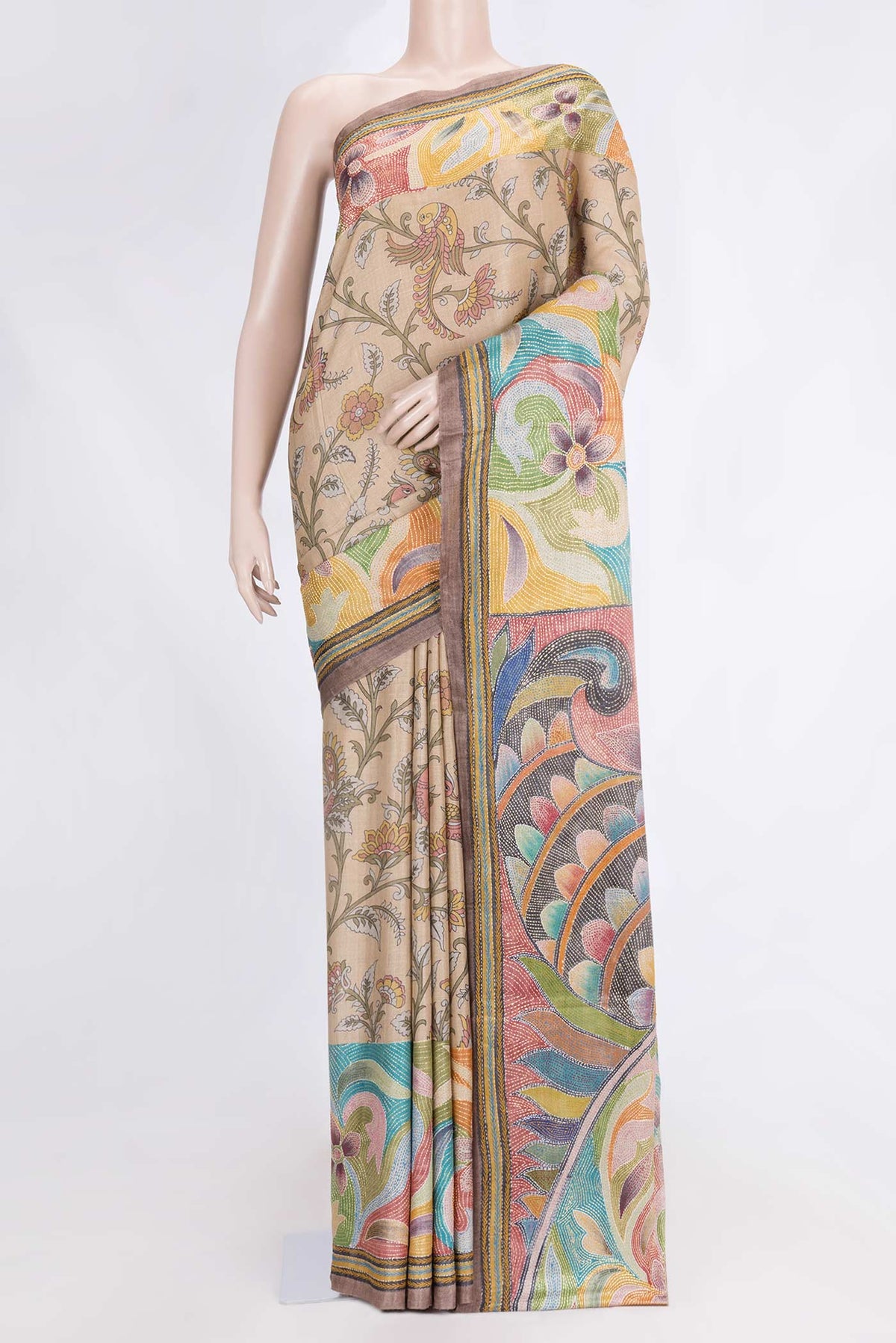 Beige Dual Tone Tussar Saree with Printed design on the body and Embroidery Border.  displayed on a mannequin
