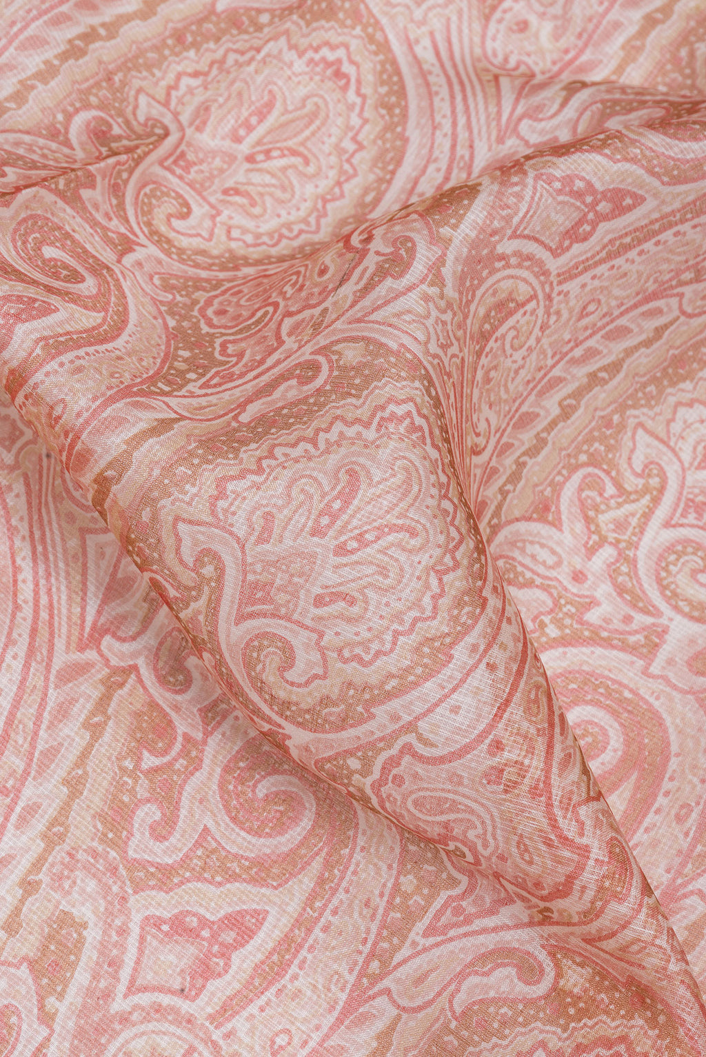 Close up of Pink Kota Silk Saree with Printed design on the body and Zari Border.  displaying folds