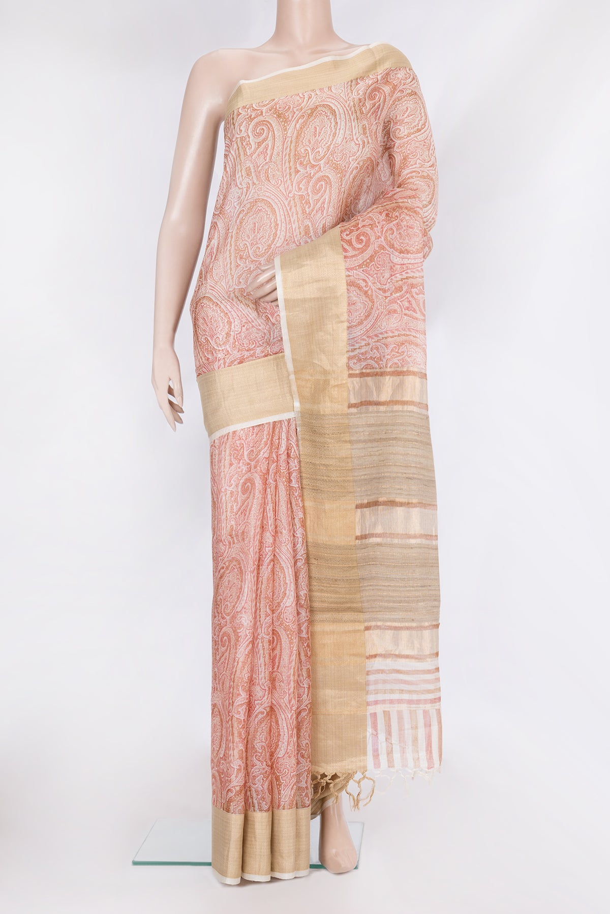 Pink Kota Silk Saree with Printed design on the body and Zari Border.  displayed on a mannequin